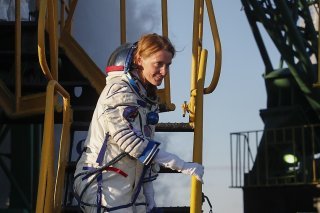 L'astronaute américaine Loral O'Hara a embarqué à bord de la fusée Soyouz avec deux collègues russes.